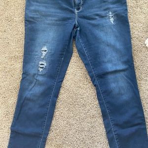 Maurice’s tattered jeans